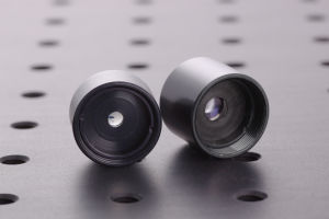 Focusing/collimating lens combinations